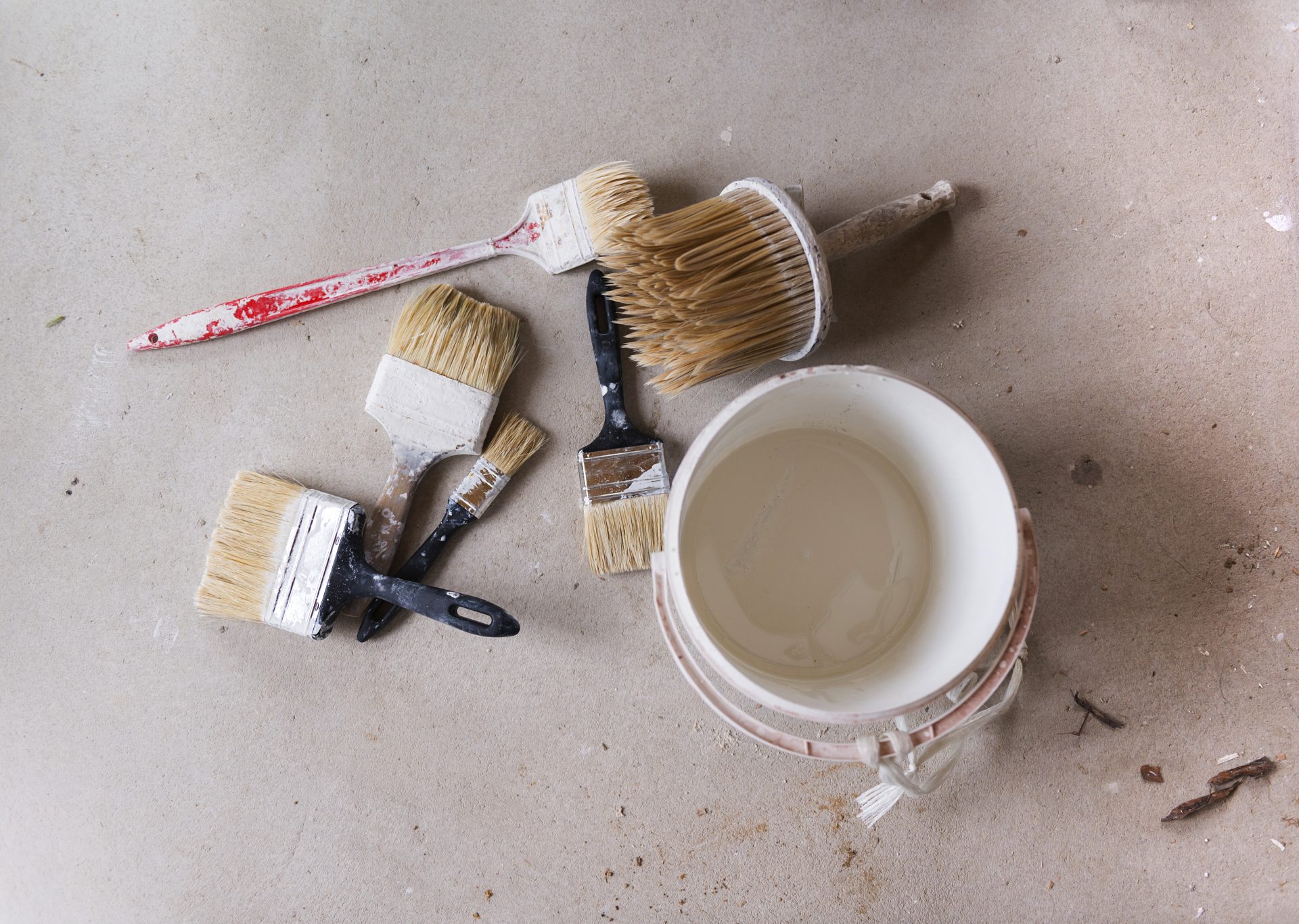 Tips on Selecting the Best Tile Flooring for Your Space Graphicstock Preparing To Paint The Wall Detail Of Paintbrush And Bucket Of Color On The Floor HRxN6cN3WW Scaled